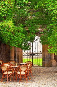 Outdoor cafe among cobble stone strrets, Rome Italy