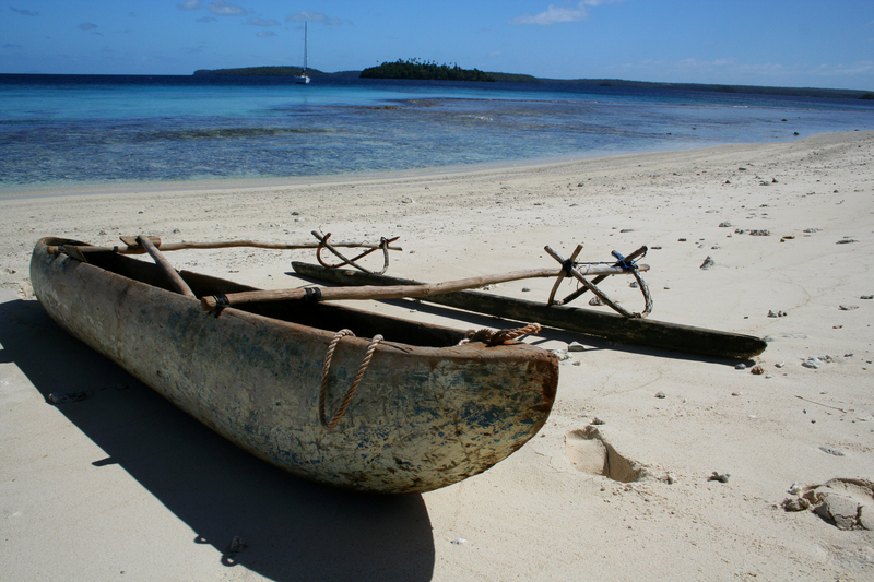 Native polynesian canoe on a remote beach on a small island in Vava'u, Tonga